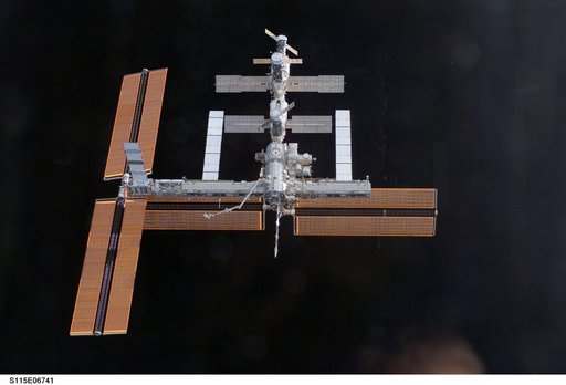 Overall exterior view of the ISS during undocking and Flyaround Operations for STS-115 Space Shuttle Atlantis