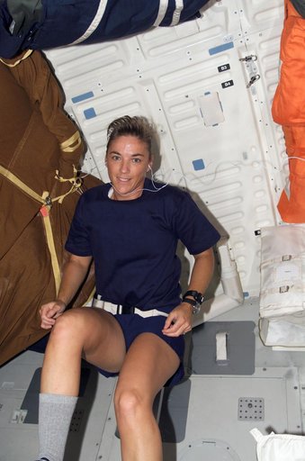 STS-115 MS Stefanyshyn-Piper exercises on the CEVIS in the MDDK of the Space Shuttle Atlantis