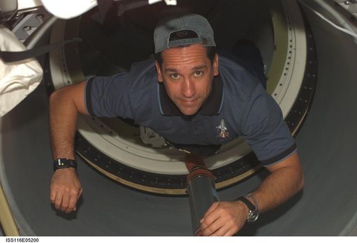 STS-116 Pilot Oefelin in the A/L area on Space Shuttle Discovery