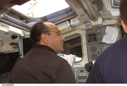 STS-116 Commander Polansky in the aft FD on Space Shuttle Discovery