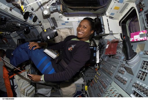 STS-116 MS Higginbotham works in the aft FD on Space Shuttle Discovery6