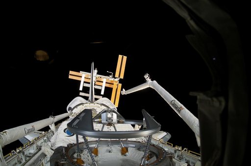 Payload Bay as STS-116 Space Shuttle Discovery approaches the ISS