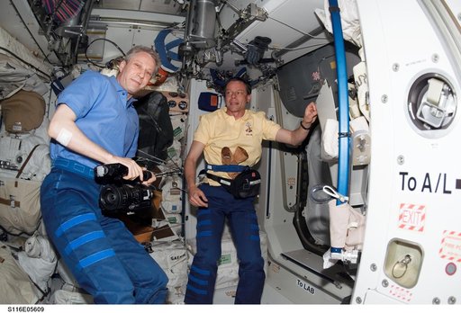 Crewmembers Reiter and Fuglesang in the U.S. Laboratory during Joint Operations