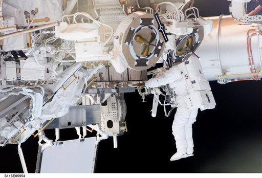 STS-116 MS Fuglesang works at the P3/P4 Truss during EVA 1