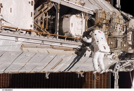 STS-116 MS Fuglesang,works at the P1 Truss during EVA 1
