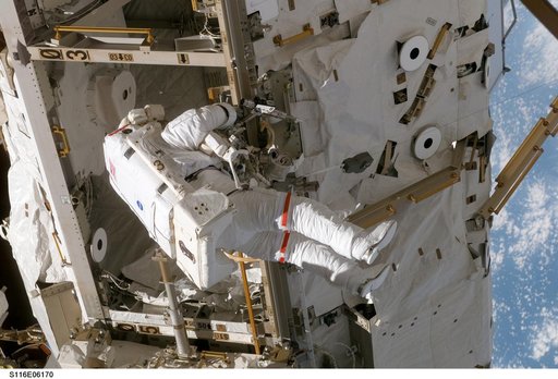 STS-116 MS works on S0 Truss during EVA 2