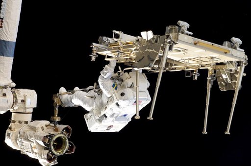 STS-116 MS Fuglesang relocates CETA 2 cart on EVA 2