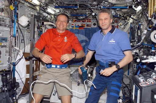 STS-116 MS Fuglesang and STS-116 FE Reiter conduct PAO Event in the U.S. Laboratory