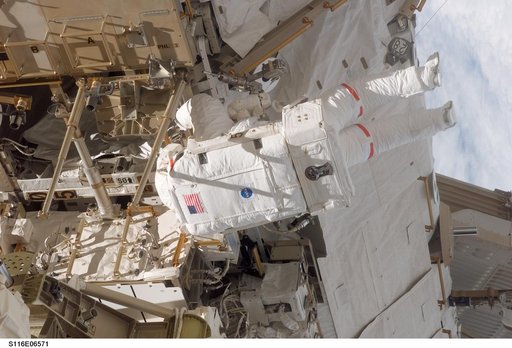 STS-116 MS Curbeam,Jr.,works on the S0 and S1 Truss during EVA 3