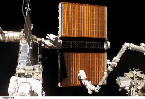 STS-116 MS Fuglesang and Curbeam,Jr.,during EVA 4