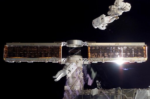 STS-116 MS Fuglesang and Curbeam,Jr.,during EVA 4