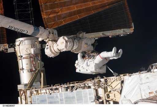 STS-116 MS Curbeam, Jr., during EVA-4