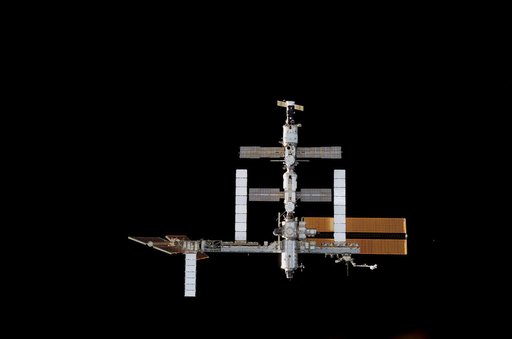 ISS during rendezvous and docking of STS-117 Space Shuttle Atlantis