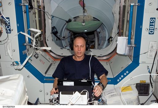 Anderson works with the TRAC experiment in the U.S. Laboratory during Joint Operations