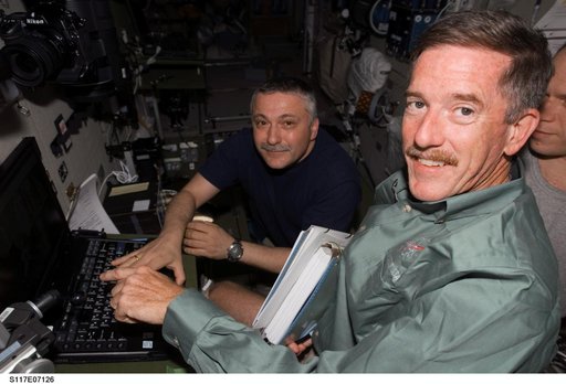 Reilly,Yurchikhin,and Kotov in the SM during Joint Operations