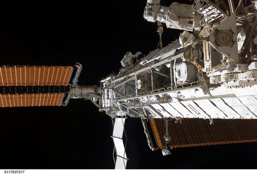 Forrester works on the S1/S3 Trusses during EVA 2 on STS-117 Mission