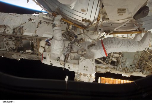 Reilly installs a water to hydrogen vent on the outside of the U.S. Laboratory during EVA 3