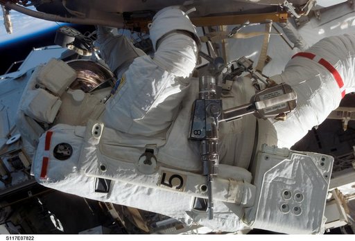 Forrester moves to the Quest A/L during Extravehicular Activity 4