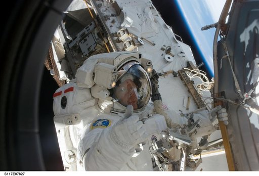 Forrester moves to the Quest A/L during Extravehicular Activity 4