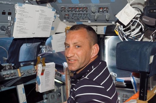 View of Hobaugh posing for a photo in the FD during STS-118