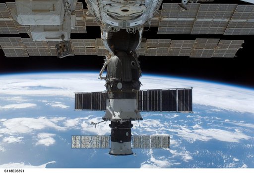 View of docked Soyuz and Progress Spacecraft taken during STS-118