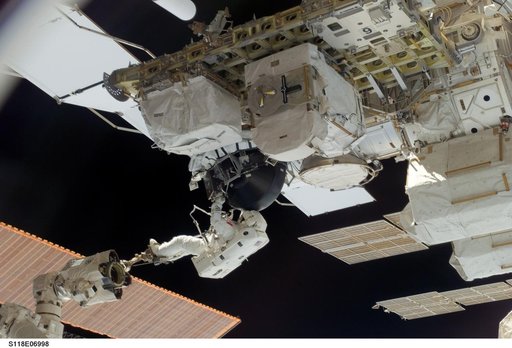 View of MS Williams transporting the new CMG during EVA 2