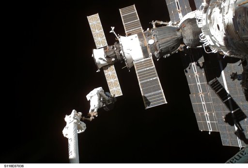 View of MS Williams transporting the new CMG to the Z1 Truss during EVA 2