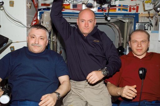 View of Crewmember posing for a photo in the US Lab during STS-118/Expedition 15 Joint Operations