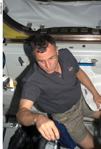 Williams working in the A/L during STS-118/Expedition 15 Joint Operations