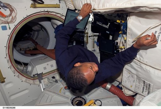 View of MS Drew working on the Shuttle Endeavour during STS-118