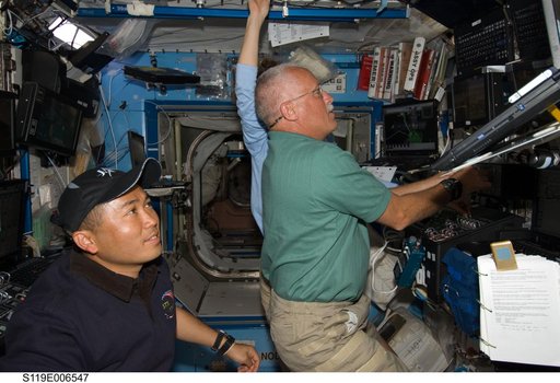 Crew at Robotics Workstation (RWS) for SSRMS OPS