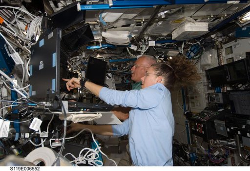 Crew at Robotics Workstation (RWS) for SSRMS OPS