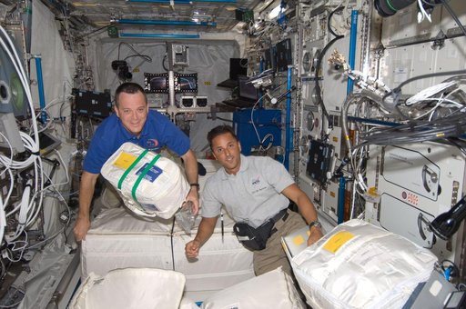 Arnold and Acaba with Stowage in European Laboratory Columbus