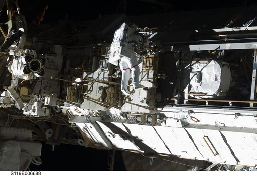 STS-119 Extravehicular Activity (EVA) 1 Translate and Ingress