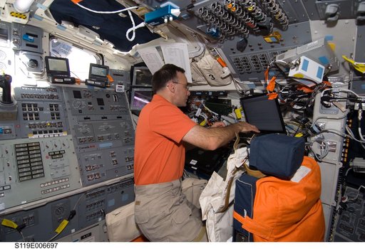 Archambault at Laptop on AFT Flight Deck (FD)