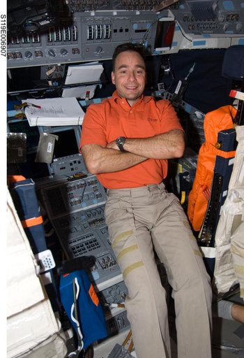 Archambault poses for photo on Flight Deck (FD)