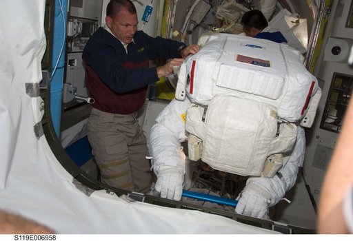 Extravehicular Mobility Unit (EMU) Cleanup OPS following STS-119 EVA 2