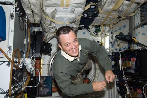 Arnold poses on Middeck (MDDK)