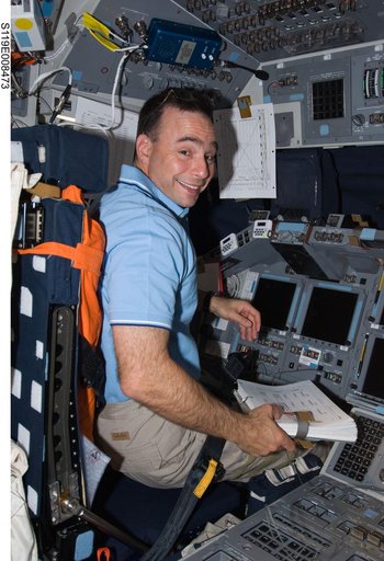Archambault seated on Flight Deck (FD) with timeline