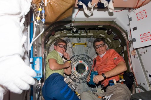 Whitson and Nespoli prepare to open Node 2 hatch