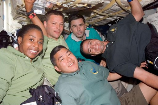 STS-120 crew and Expedition 16 Malenchenko on middeck