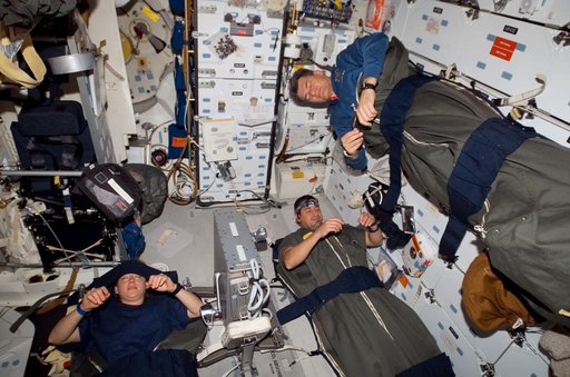 STS-120 crew on Discovery middeck