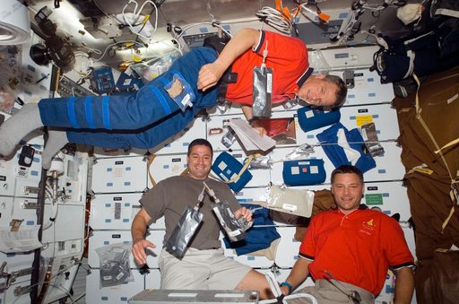 STS-120 crew on Discovery middeck
