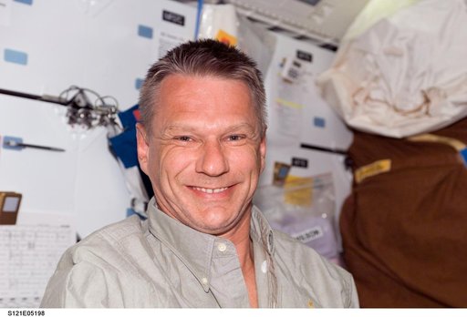 Sellers smiles at camera during STS-121