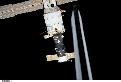 Nadir view of the SM as the orbiter Discovery closes in to dock with the ISS during STS-121