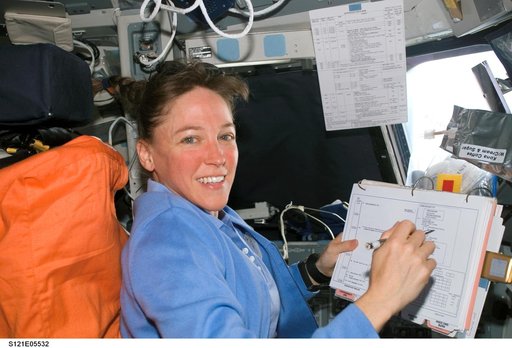 Nowak with timeline on the orbiter FD during STS-121