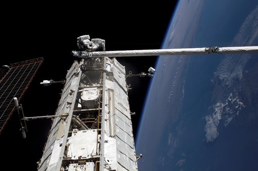 Fossum and Sellers on the P1 Truss during EVA1 on STS-121 / Expedition 13 joint operations