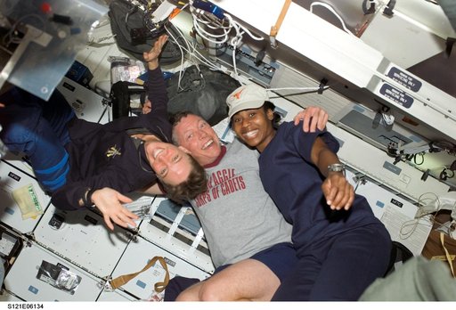 Group shot of Nowak,Fossum and Wilson on the MDK during STS-121 / Expedition 13 joint operations