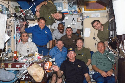 Crewmembers share a meal in the SM
