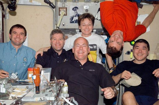 Crewmembers share a meal in SM
